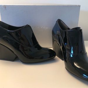 Robert Clergerie black patent booties